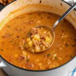 Spanish Potato Soup With Chorizo 8 Bowl of creamy Spanish potato soup with chorizo garnished with fresh parsley