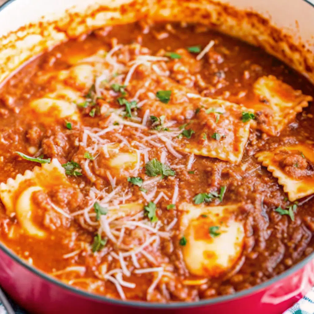 Easy Ravioli Soup 6 A steaming bowl of ravioli soup with cheese ravioli floating in rich tomato broth, garnished with fresh parsley and grated Parmesan cheese