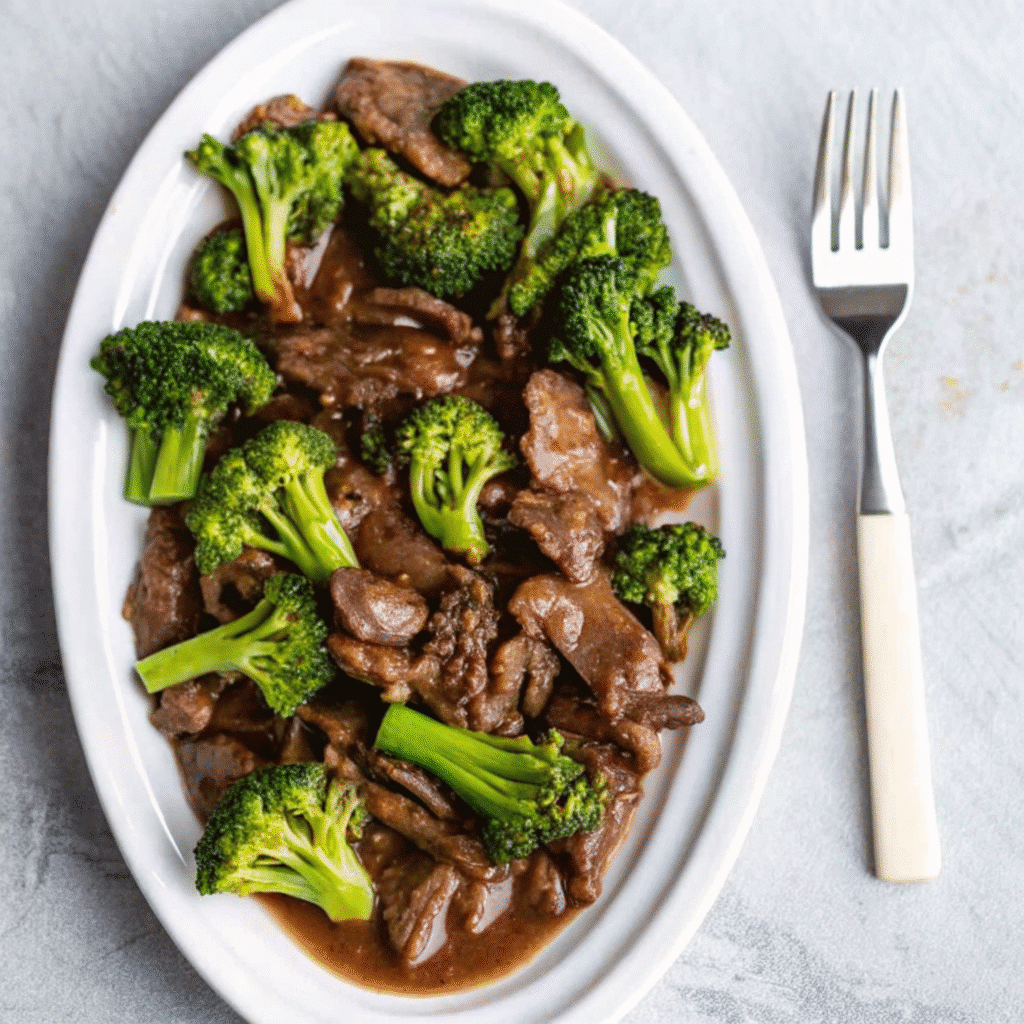 Chinese Beef and Broccoli with tender beef strips, crisp broccoli, and savory garlic-ginger sauce – ready in just 20 minutes!