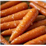 Tender glazed carrots coated in a shiny brown sugar and butter glaze.