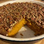Pumpkin Cobbler with Pecan Topping literally makes its own caramel sauce while it bakes and I'm still not over it. Perfect fall dessert that's easier than pie and tastes incredible with vanilla ice cream