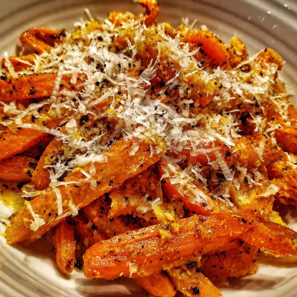 Crispy, cheesy Healthy Smashed Carrots fresh from the oven – tender inside with perfectly golden, caramelized edges
