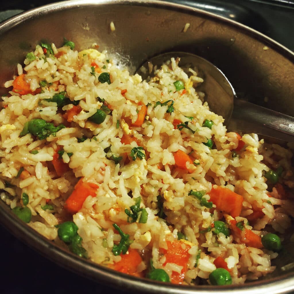 Vegetable fried rice with colorful veggies, fluffy rice, and scrambled eggs