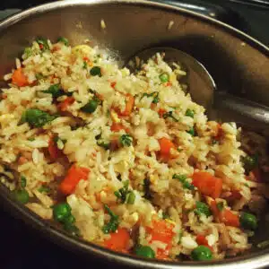 Vegetable fried rice with colorful veggies, fluffy rice, and scrambled eggs