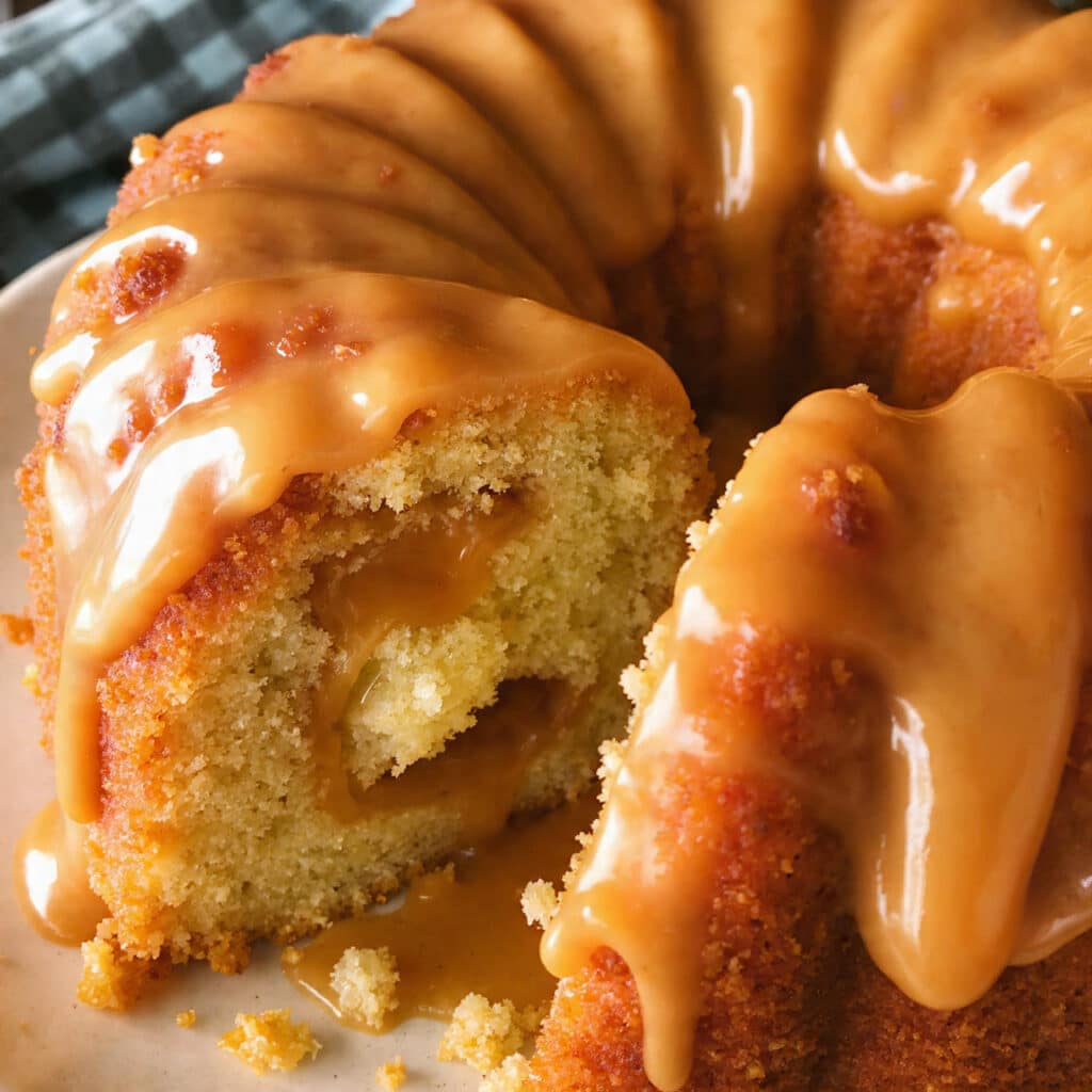 Salted Caramel Kentucky Butter Cake is soaked with buttery caramel syrup and topped with a glossy salted caramel glaze