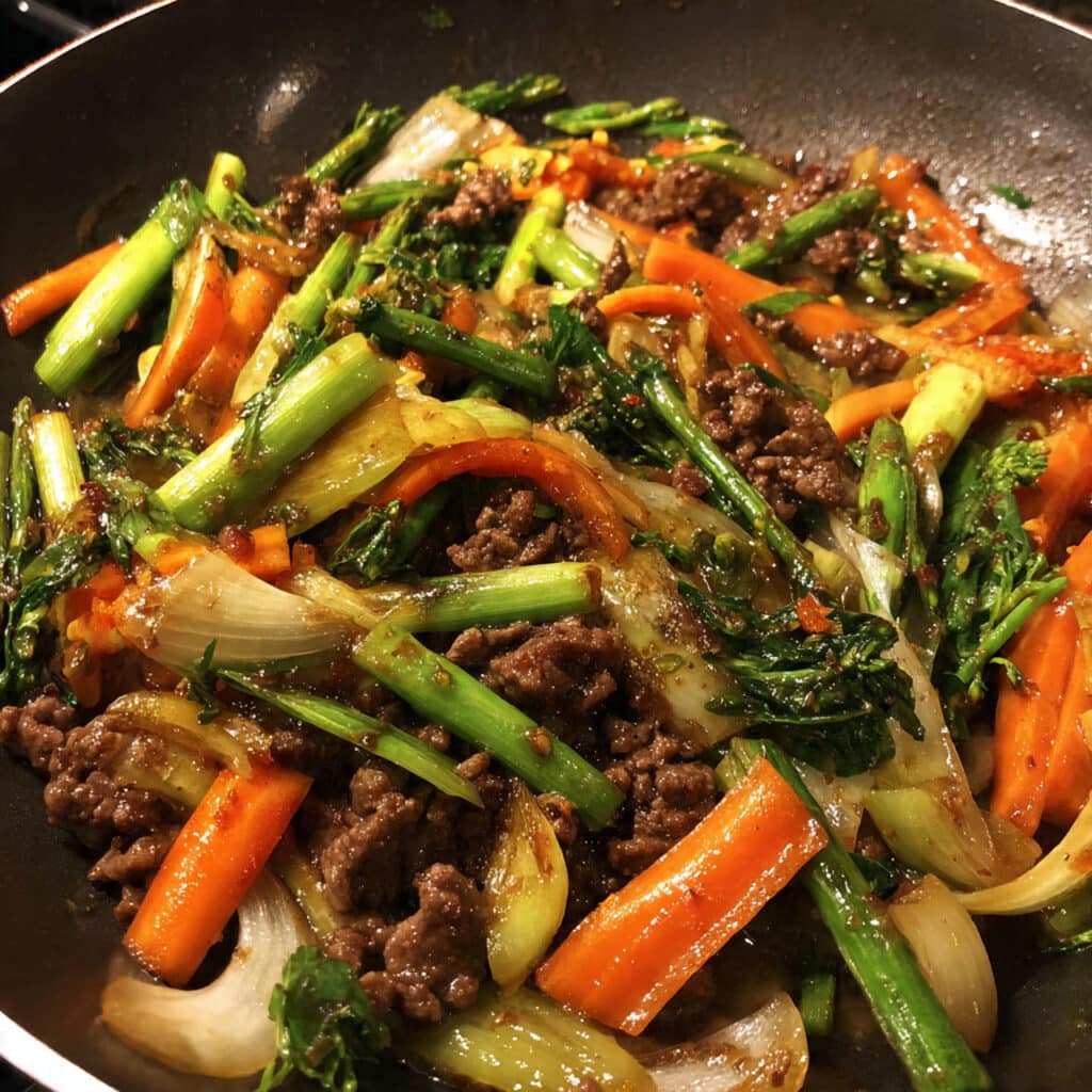 Ground Beef Stir Fry – Better than takeout and ready in 30 minutes! This one-pan wonder is loaded with tender beef, crisp vegetables, and a sweet-savory sauce