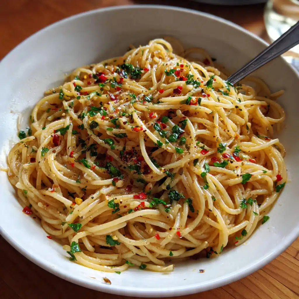 Spaghetti aglio e olio tossed with garlic, olive oil, red pepper flakes, and parsley