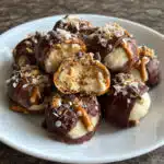 ookie Dough Pretzel Bites are the ultimate sweet and salty treat! Edible cookie dough meets crunchy pretzels and rich chocolate coating