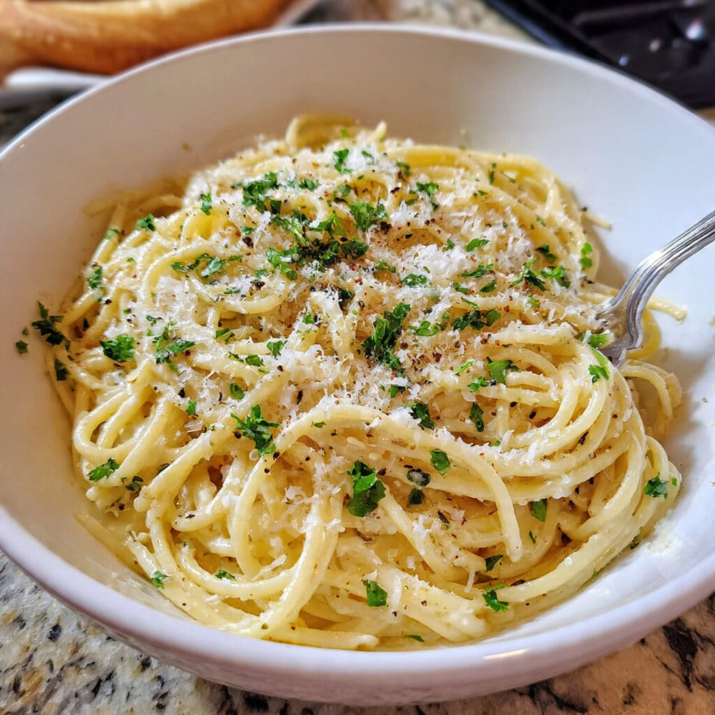 easy garlic butter pasta, simple garlic pasta recipe, buttery garlic noodles, quick pasta dinner, weeknight pasta recipe, garlic parmesan pasta, 20 minute pasta, Italian butter pasta, homemade garlic pasta
