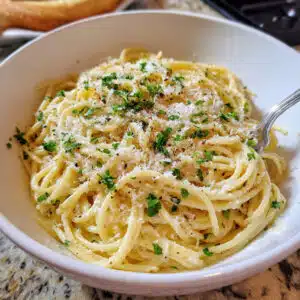 easy garlic butter pasta, simple garlic pasta recipe, buttery garlic noodles, quick pasta dinner, weeknight pasta recipe, garlic parmesan pasta, 20 minute pasta, Italian butter pasta, homemade garlic pasta