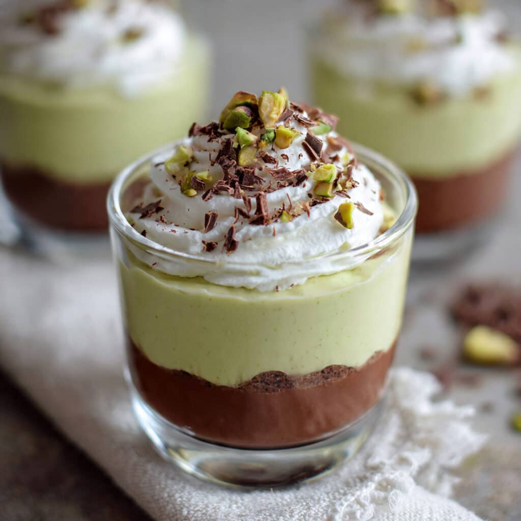 St. Patrick's Day Green Shake Pudding Cups are light, minty, and so easy to make! Perfect for celebrating with a no-bake dessert