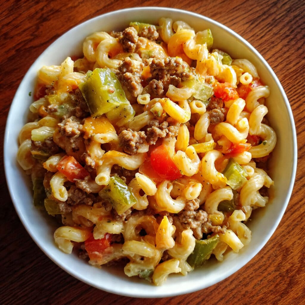Big Mac Pasta Salad tastes exactly like your favorite burger—but you can eat it with a fork! Creamy, tangy, and loaded with all the classic flavors