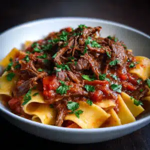 Short Rib Ragu 10 Short Rib Ragu is pure comfort food magic – melt-in-your-mouth beef braised low and slow in a rich tomato sauce. Perfect for Sunday dinners